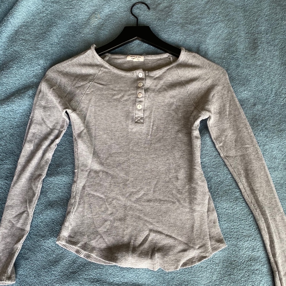 grey thermal shirt with buttons.